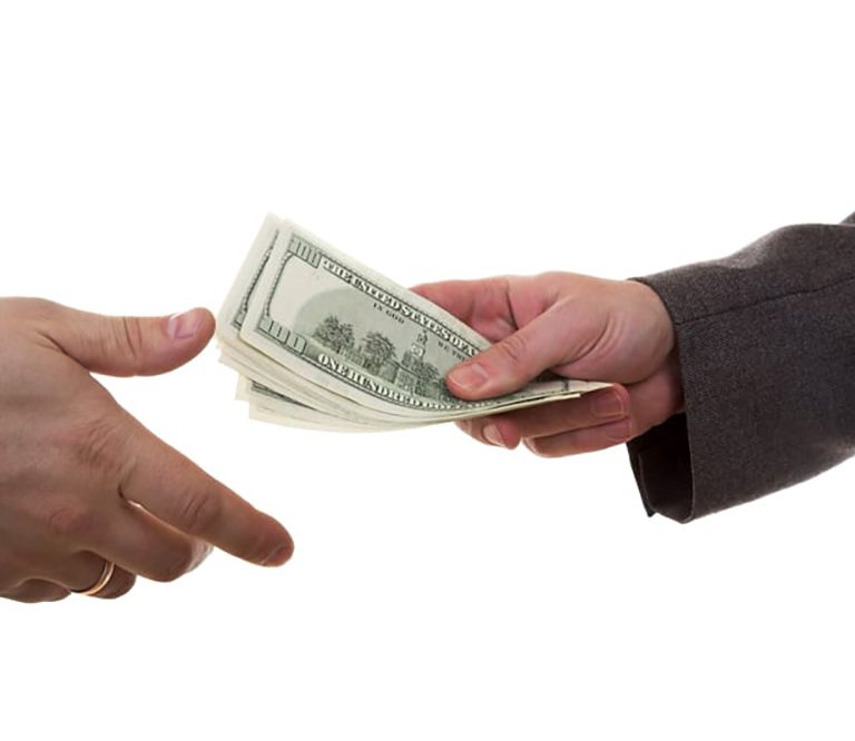 Hands passing money to represent small business money collectionsuter for article