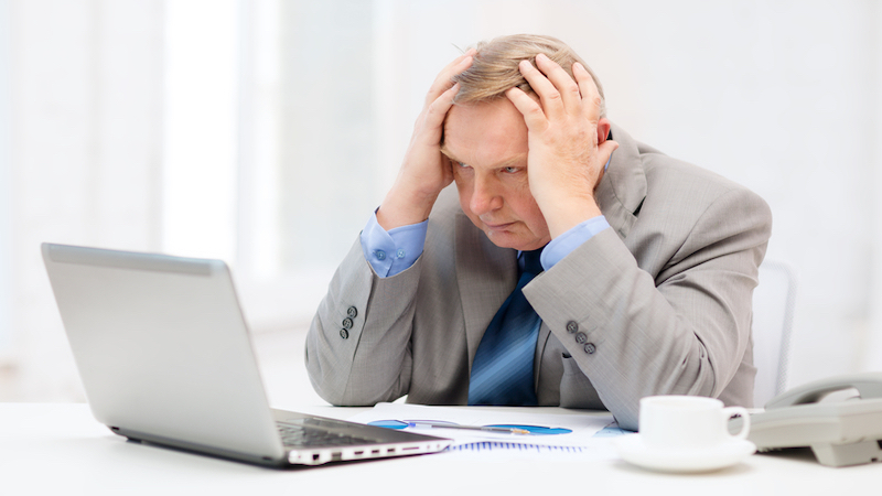stressed businessman at laptop. By Syda Productions Dreamstime. Dr. Daneen Skube, executive coach, trainer, therapist, and speaker, suggests ways to adapt to the rapid change in today’s work world, with all the stress that accompanies it.
