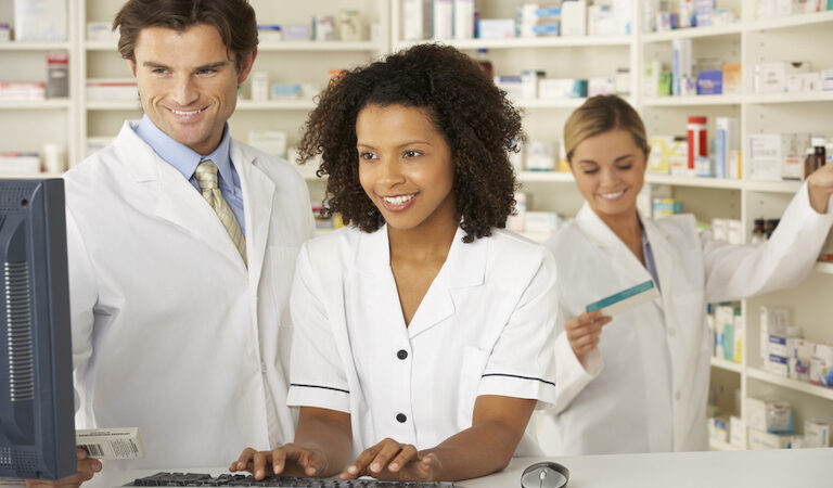 pharmacists working together. by Monkey Business Images. For case study for Bremo Pharmacy
